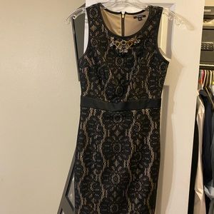 Womens dress, worn a handle full of times